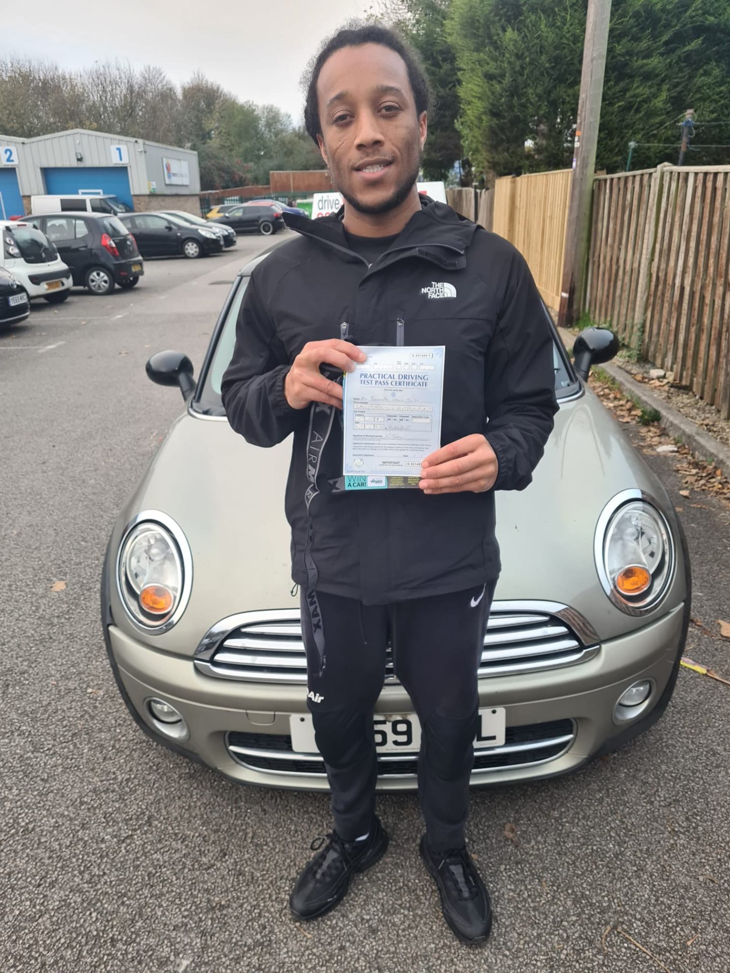 Masters Driving School student passed practical driving test holding pass certificate